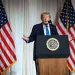 President Donald J. Trump speaking at a podium with the Presidential Seal, used as a file photo for foreign policy news.